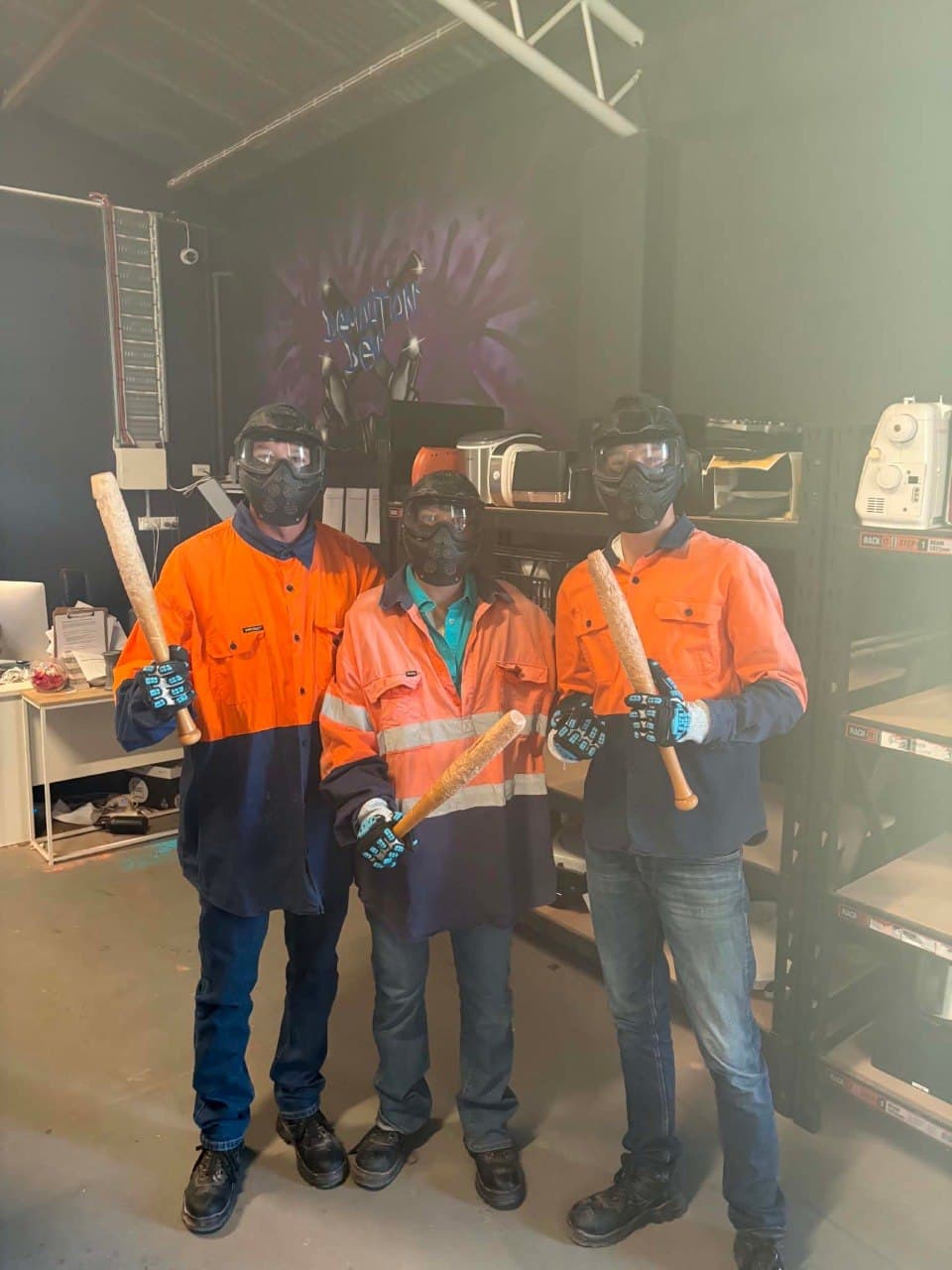 Crew geared up in hi-vis with sledgehammers